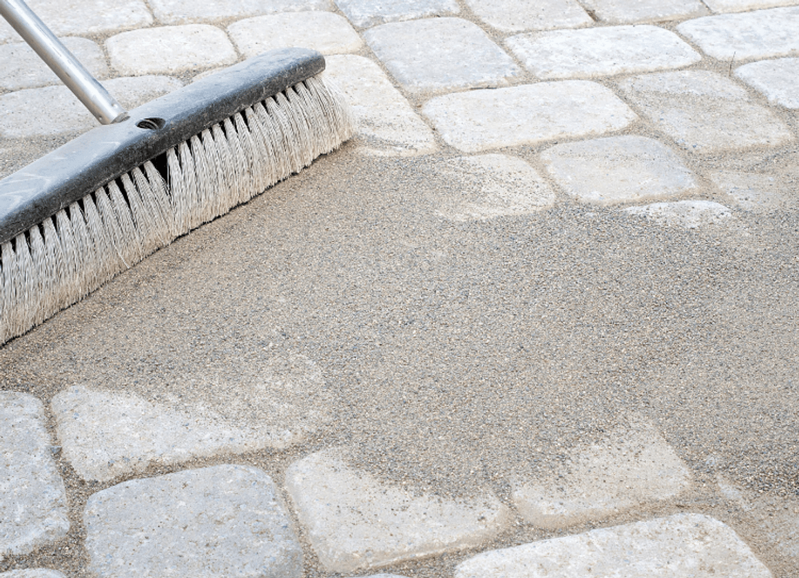 Polymeric sand for filling paver joints and preventing weed growth