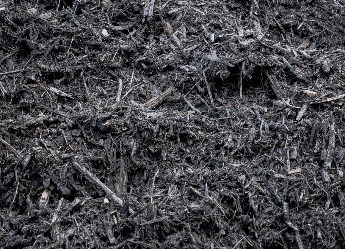 Onyx black triple shred mulch for garden beds and landscaping